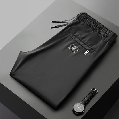 【40-115kg】🔥【M-5XL】Pantaloni casual elastici pentru bărbați, din mătase glacială, la modă, vara 2025 