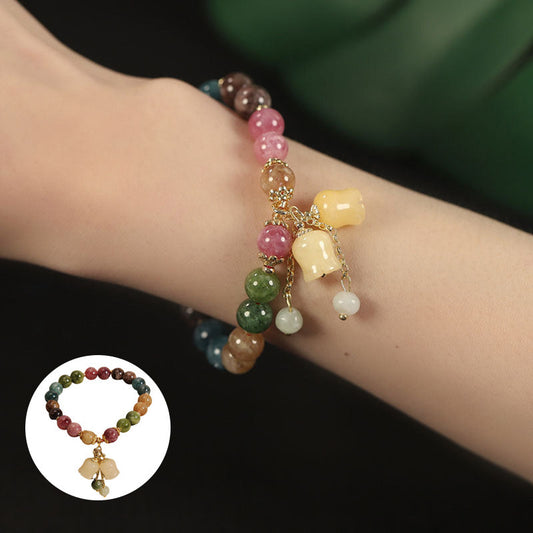 ✨🌷【Compra uno y llévate otro gratis】Pulsera de lirio de turmalina sintética, ligera, lujosa y de alta gama