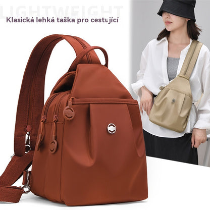 👜 Batoh a taška přes rameno s několika kapsami, které lze transformovat