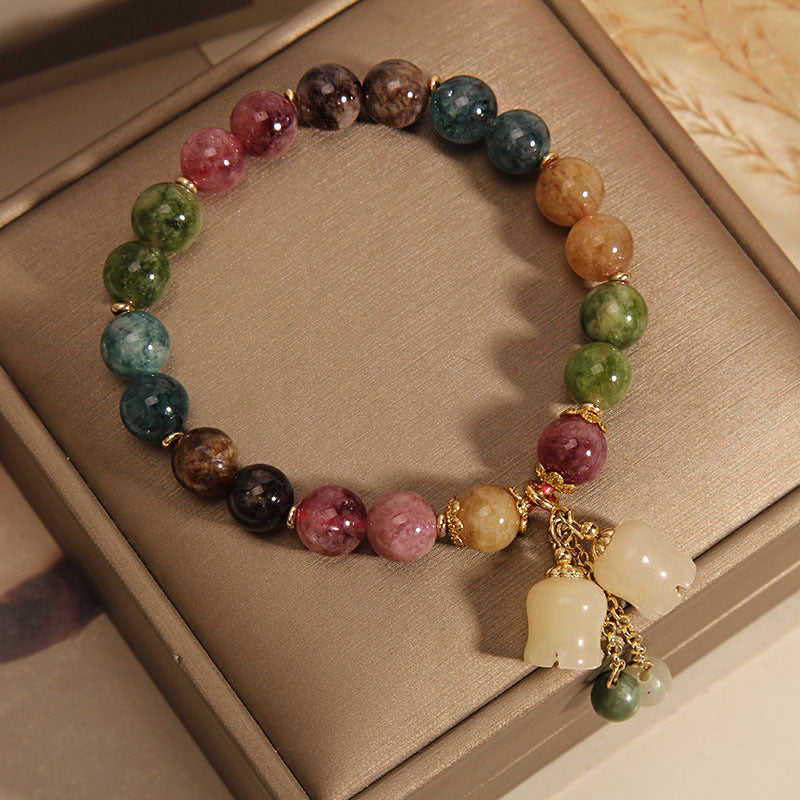 ✨🌷【Compra uno y llévate otro gratis】Pulsera de lirio de turmalina sintética, ligera, lujosa y de alta gama