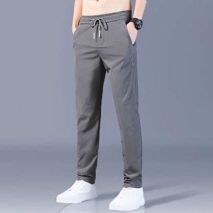 ✨🏄‍♂️【M-5XL】🔥Nuevos pantalones elásticos casuales de seda de hielo de verano para hombre, cómodos y frescos