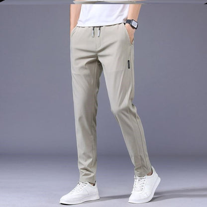 ✨🏄‍♂️【M-5XL】🔥Nuevos pantalones elásticos casuales de seda de hielo de verano para hombre, cómodos y frescos